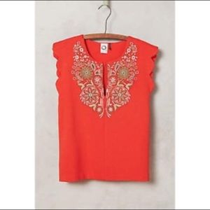 Red top with embroidery and beading